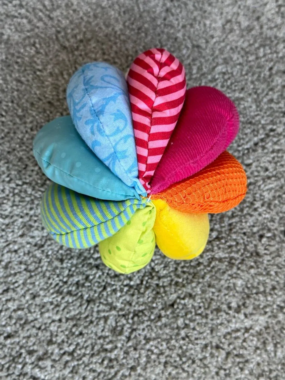 2 Balls designed for sensory development in infants and toddlers. 5” and 7”